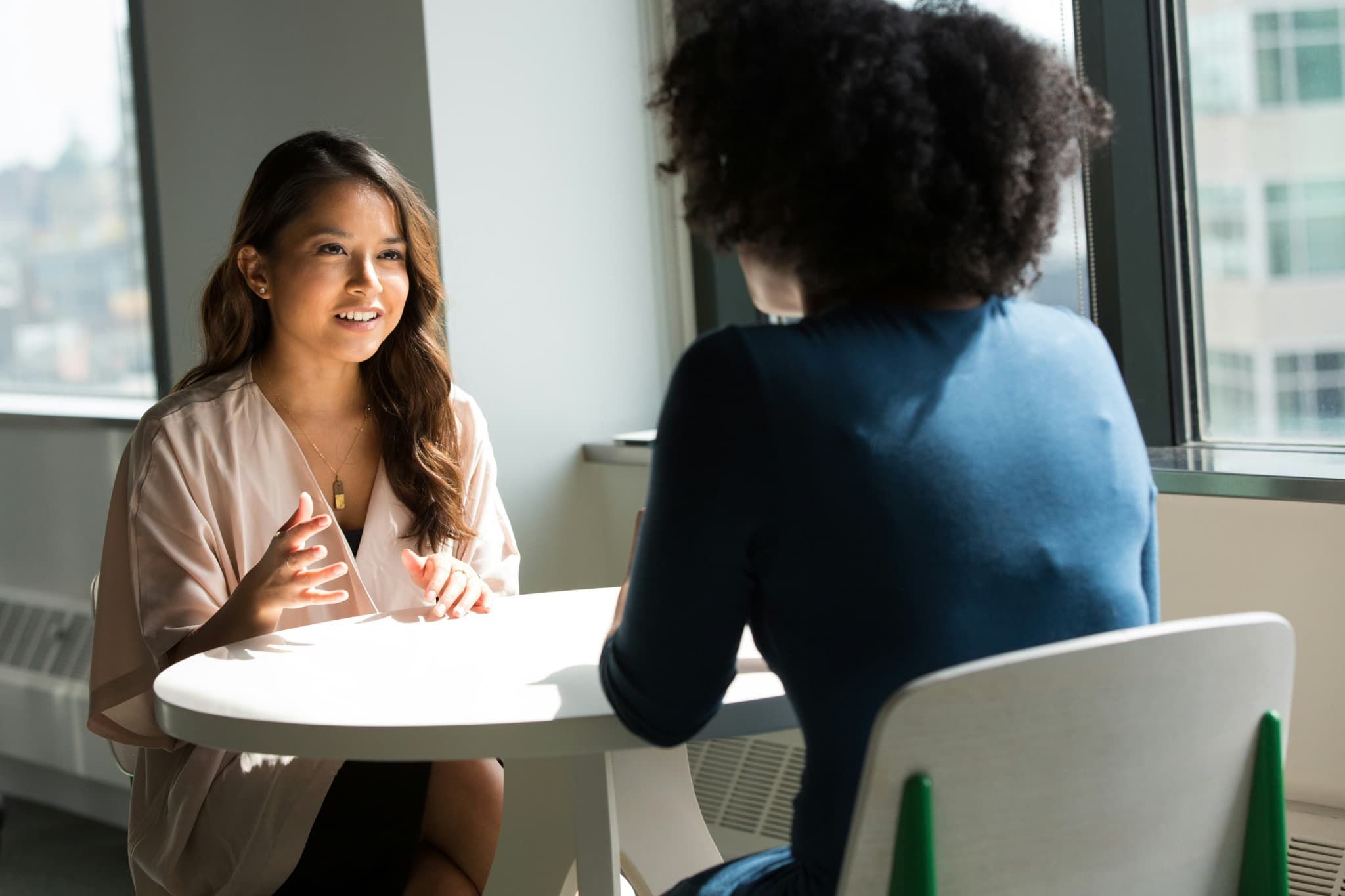 Two professionals discussing an investment opportunity